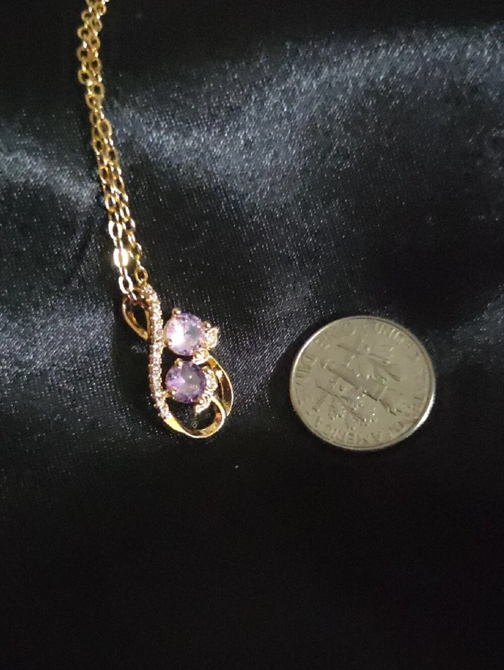 Gold Music Note Pendant Necklace with Purple Gemstones